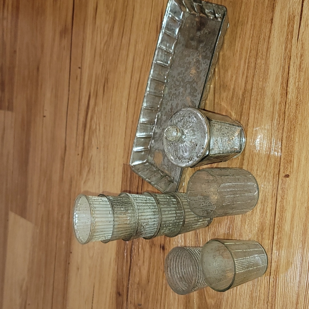 9 mercury glass votive holder West Elm and 1 mercury glass tray Pottery Barn